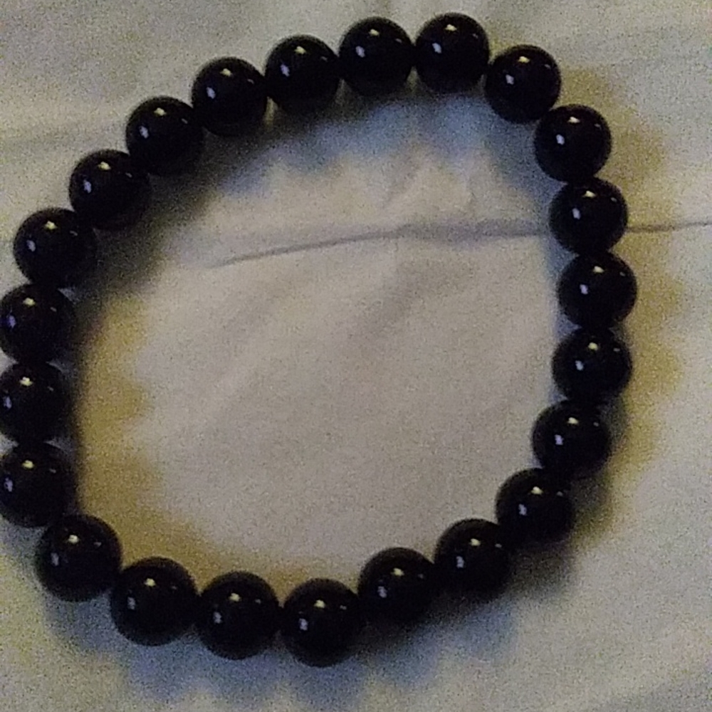Black beaded bracelet gently used